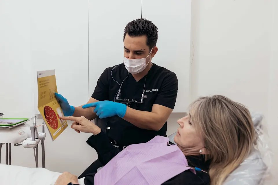 Dr. Zerquis in a discussion with a patient